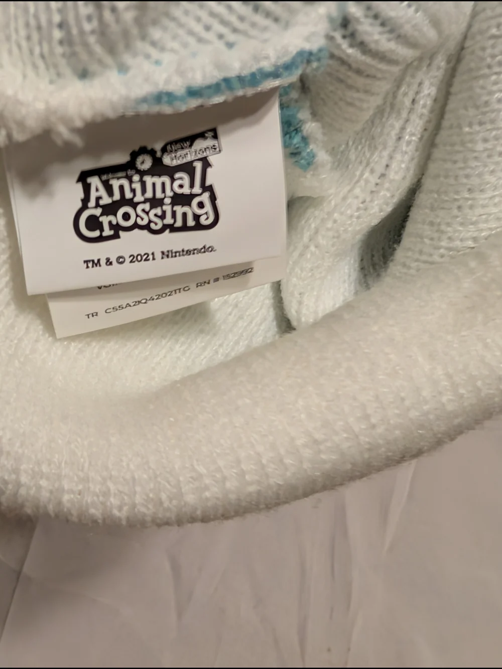 Kids CultureflyLight Blue and White Animal CrossKnit Beanie with Leaf Patch